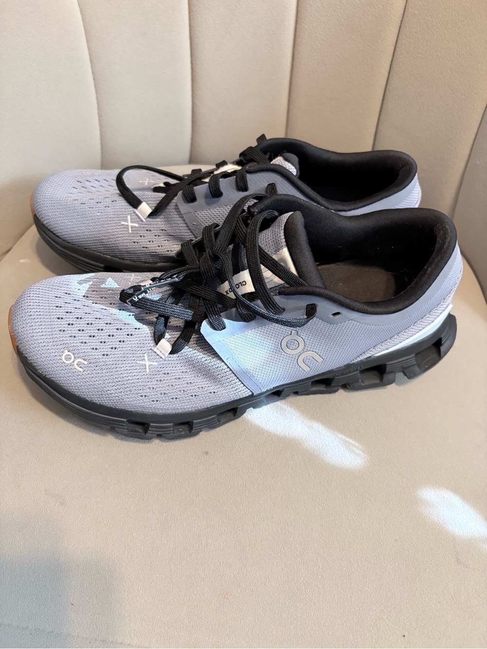 On Running Women's Athletic Shoes in Light Gray with Black Accents